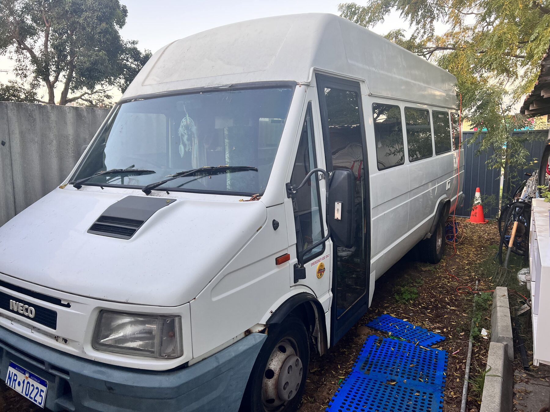 The 1990s Iveco bus where the deck was written, parked in a Perth backyard